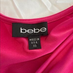 Bebe Fuchsia Draped Blouse with cut out shoulders